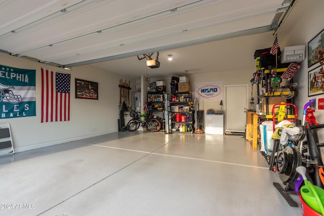 garage featuring a garage door opener