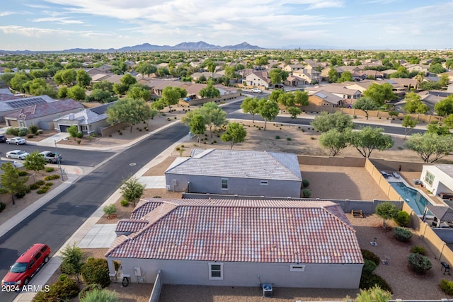 birds eye view of property featuring a mountain view