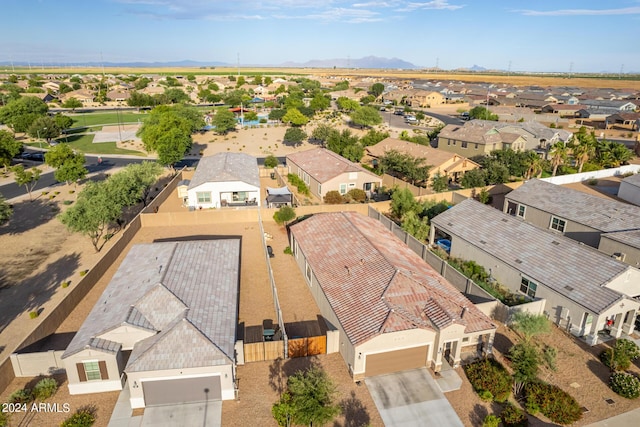 birds eye view of property featuring a mountain view