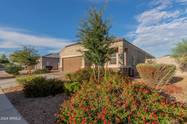 view of front of property with a garage