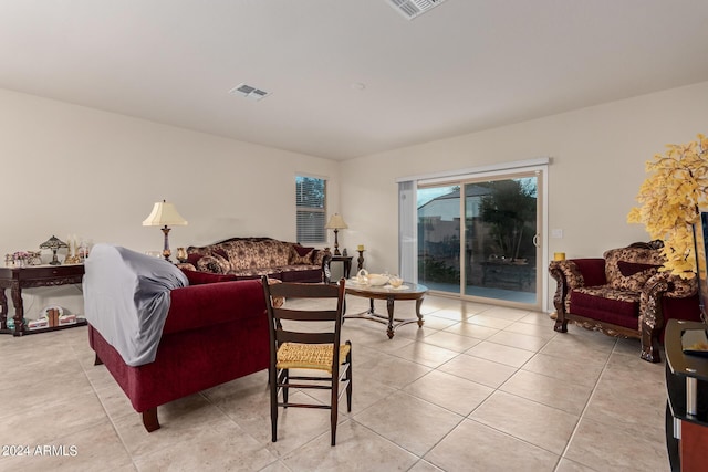 living room with light tile patterned floors