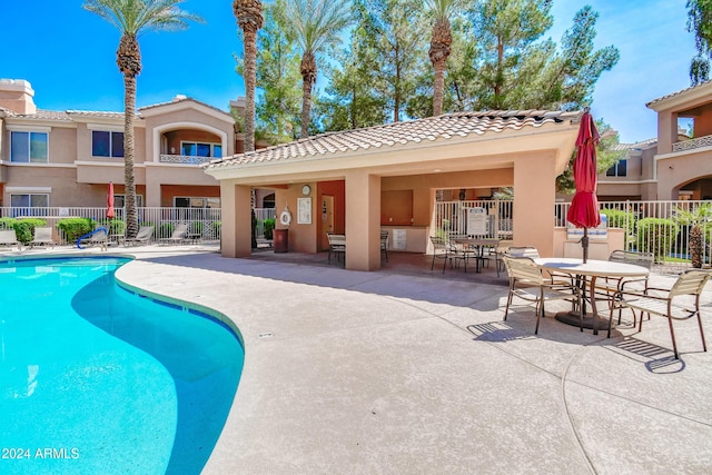 view of pool with a patio