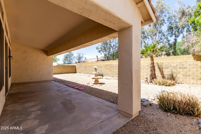 view of patio with a fenced backyard