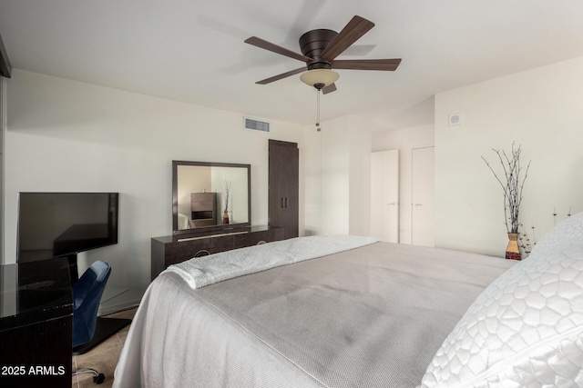 bedroom featuring visible vents and a ceiling fan