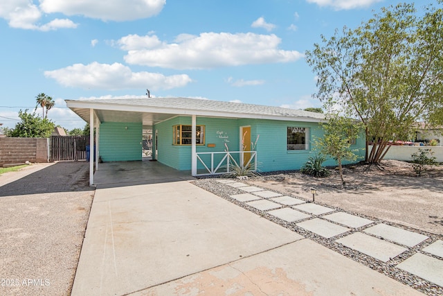 805 E Jackson Ave, Buckeye, AZ 85326 - ranch-style home with driveway, a carport, and a gate