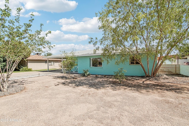 805 E Jackson Ave, Buckeye, AZ 85326 - view of front facade with driveway and an attached carport