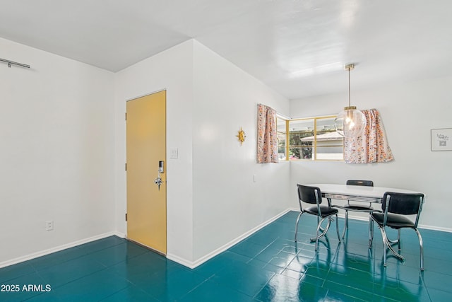 805 E Jackson Ave, Buckeye, AZ 85326 - dining room featuring baseboards