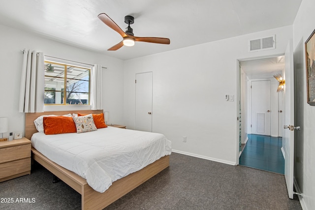 805 E Jackson Ave, Buckeye, AZ 85326 - carpeted bedroom with a ceiling fan and baseboards
