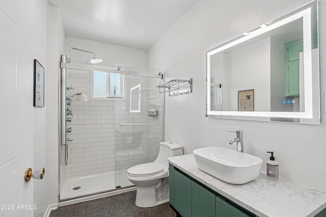 805 E Jackson Ave, Buckeye, AZ 85326 - full bathroom featuring a shower stall, vanity, and toilet