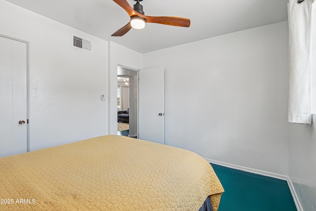 805 E Jackson Ave, Buckeye, AZ 85326 - bedroom with baseboards and a ceiling fan