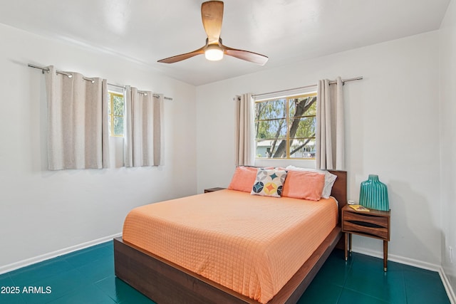 805 E Jackson Ave, Buckeye, AZ 85326 - bedroom with baseboards and a ceiling fan