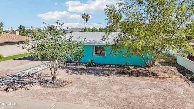 805 E Jackson Ave, Buckeye, AZ 85326 - view of property hidden behind natural elements with a shingled roof