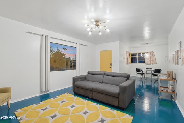 805 E Jackson Ave, Buckeye, AZ 85326 - tiled living room with a chandelier and baseboards