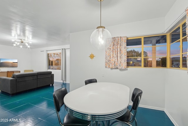 805 E Jackson Ave, Buckeye, AZ 85326 - dining room featuring baseboards and dark tile patterned floors