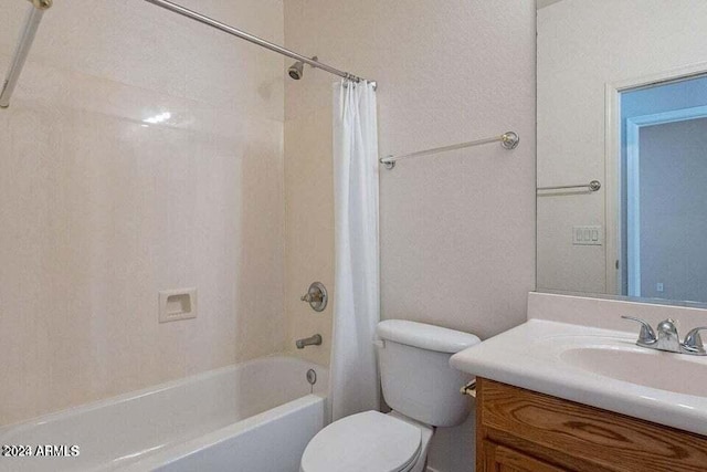 full bathroom with shower / bath combination with curtain, vanity, and toilet