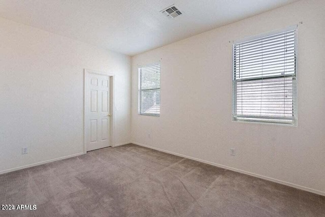 view of carpeted spare room