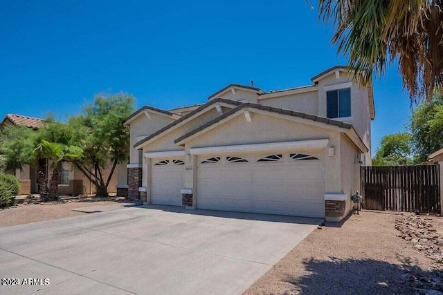 view of front of home with a garage