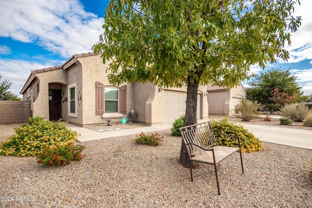 view of front of property with a garage