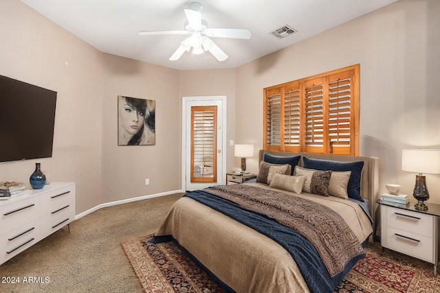 bedroom featuring visible vents, baseboards, a ceiling fan, and carpet flooring