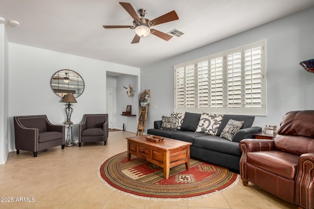 living room featuring ceiling fan, light tile patterned floors, and visible vents