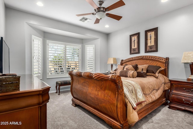 carpeted bedroom featuring baseboards, a ceiling fan, visible vents, and recessed lighting