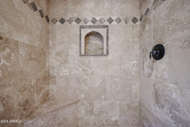 details featuring a tile shower