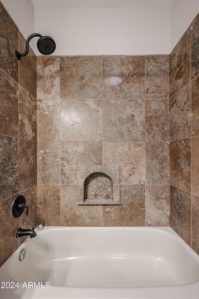 bathroom featuring shower / washtub combination