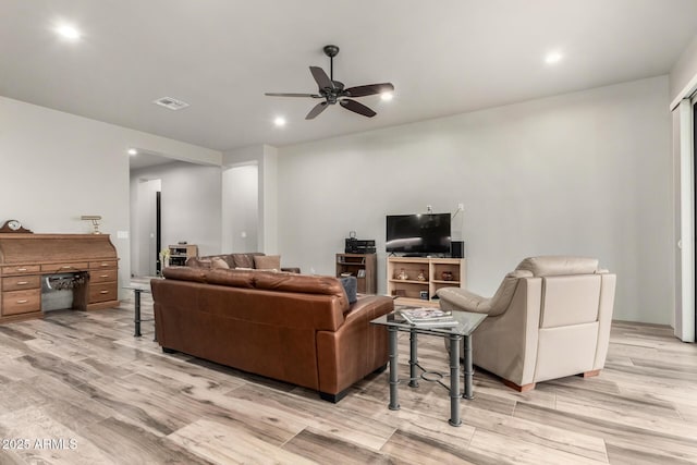 22050 W El Grande Trl, Wickenburg, AZ 85390 - living room with light wood-style floors, ceiling fan, visible vents, and recessed lighting