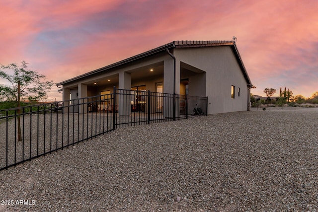 22050 W El Grande Trl, Wickenburg, AZ 85390 - exterior space featuring fence and stucco siding