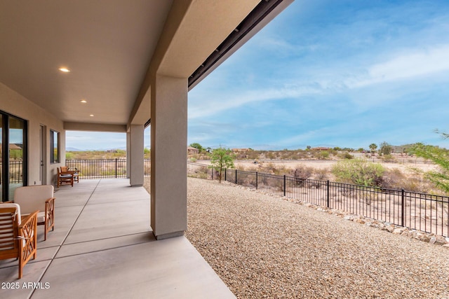 22050 W El Grande Trl, Wickenburg, AZ 85390 - view of patio featuring fence