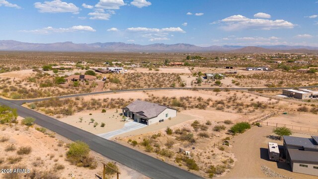 22050 W El Grande Trl, Wickenburg, AZ 85390 - bird's eye view featuring a rural view, a mountain view, and view of desert