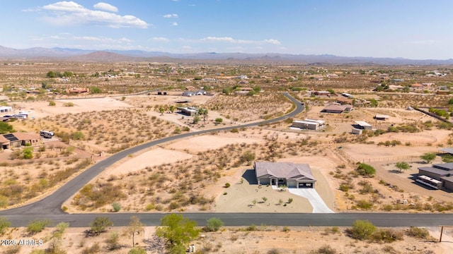 22050 W El Grande Trl, Wickenburg, AZ 85390 - bird's eye view featuring a rural view, a mountain view, and view of desert