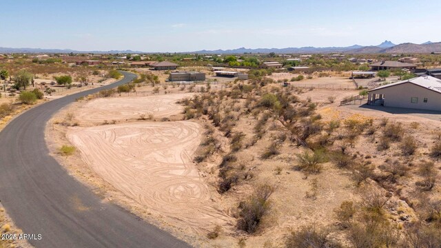22050 W El Grande Trl, Wickenburg, AZ 85390 - drone / aerial view featuring a mountain view
