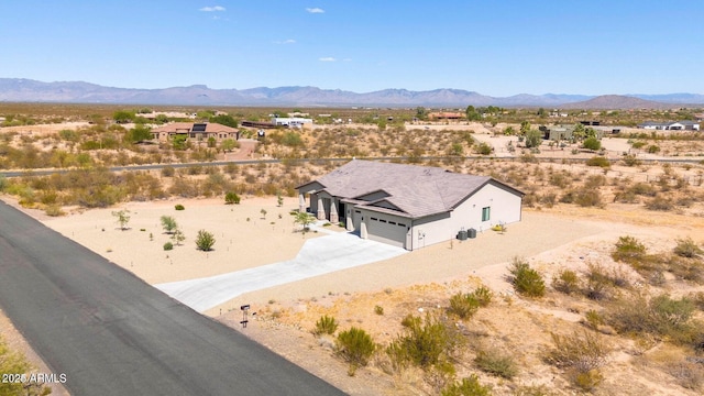 22050 W El Grande Trl, Wickenburg, AZ 85390 - aerial view featuring a mountain view, a rural view, and view of desert