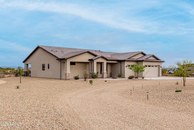 22050 W El Grande Trl, Wickenburg, AZ 85390 - single story home featuring concrete driveway, stucco siding, an attached garage, and a tile roof
