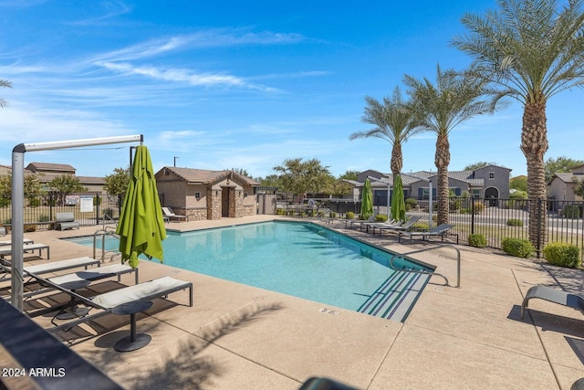 view of swimming pool with a patio area