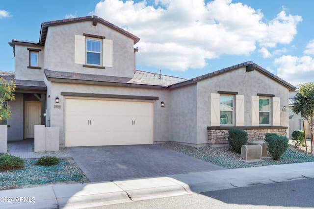 view of front of property featuring a garage