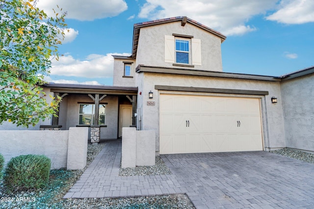 view of front of house with a garage