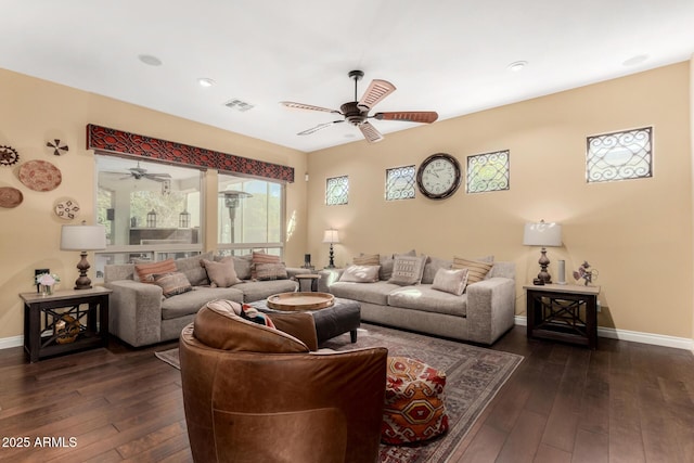 living room with dark hardwood / wood-style floors and ceiling fan