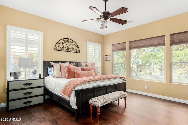 bedroom featuring hardwood / wood-style floors and ceiling fan