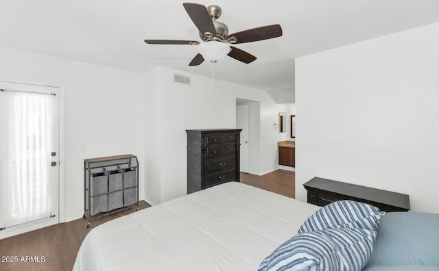 1075 E Chandler Blvd Unit 210, Chandler, AZ 85225 - bedroom with dark wood-type flooring and ceiling fan