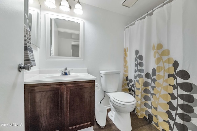 1075 E Chandler Blvd Unit 210, Chandler, AZ 85225 - bathroom featuring vanity, wood finished floors, and a shower with curtain