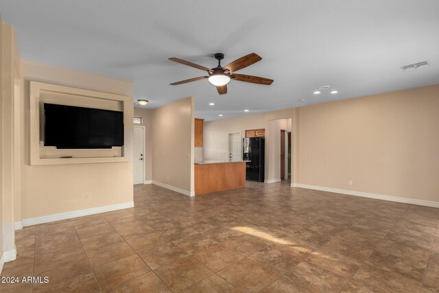 tiled dining area featuring a notable chandelier