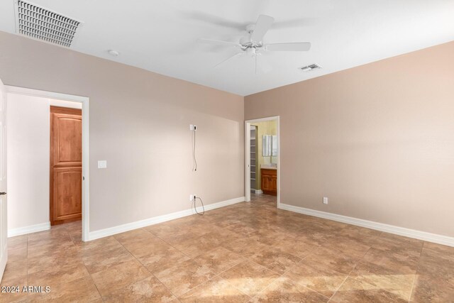 bathroom featuring toilet, tile patterned floors, and walk in shower