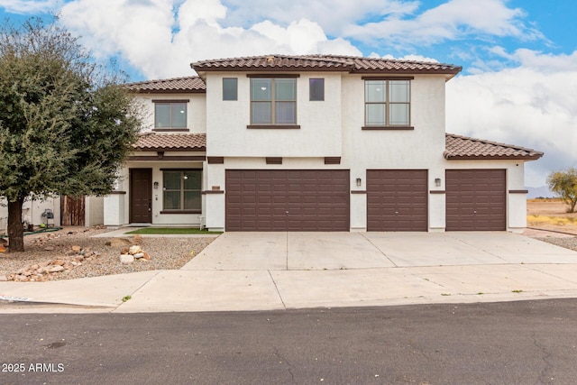 mediterranean / spanish-style home featuring a garage