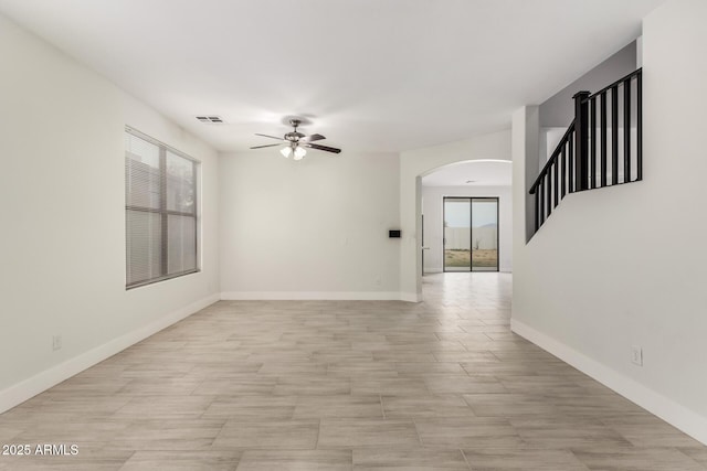 spare room featuring ceiling fan