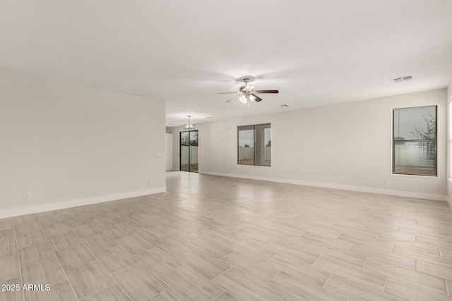 unfurnished room featuring ceiling fan and light hardwood / wood-style flooring