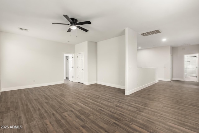 unfurnished room featuring ceiling fan and dark hardwood / wood-style floors