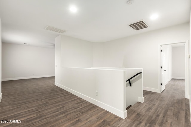 hall featuring dark hardwood / wood-style floors