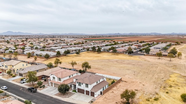 drone / aerial view featuring a mountain view